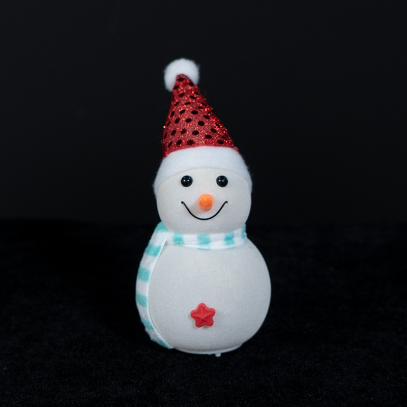 White flannel snowman with red hat